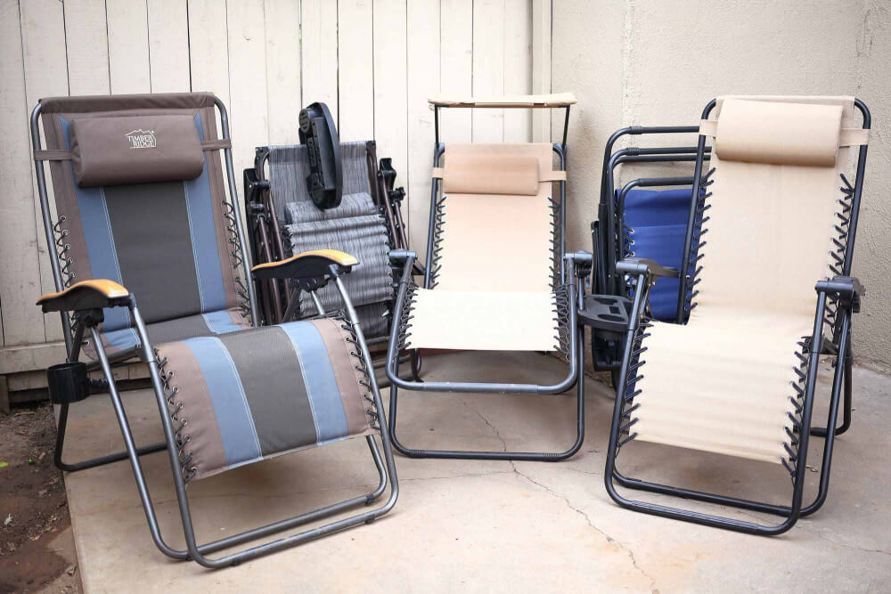 Zero-gravity patio chairs arranged outdoors